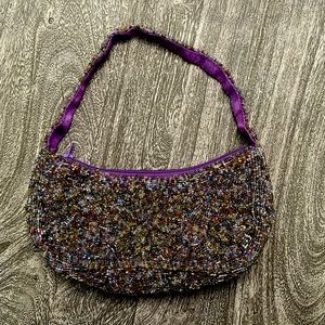 Small beaded plum/purple hued Valerie Stevens handbag in like-new condition